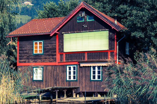 lonley wooden house by the lake in Switzerland
