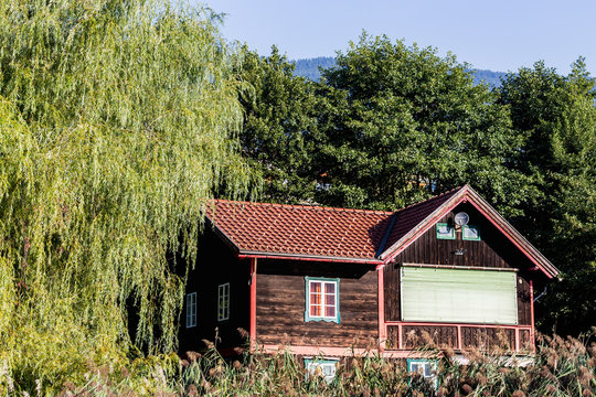 wooden house by the lake in Switzerland