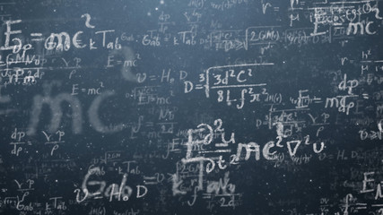 Background shot of blackboard with scientific and algebraic formulas and graphs written on it in...