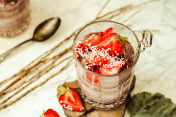 Chocolate pudding with strawberries. St. Valentine's Day dessert.