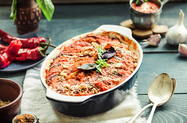 Ratatouille.Classic French stew of summer vegetables. Wooden blue background.