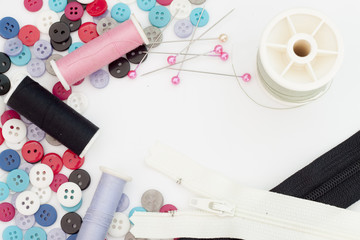 Collection of assorted Button Clothes,Sewing thread,Zipped  and Pin for sewing.