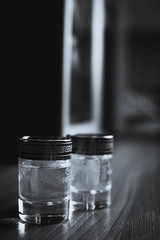 Two stacks of elite alcohol with vodka