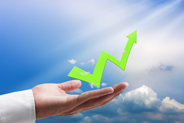 Hand with arrow  growing up,success concept