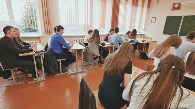 Students in the classroom are at their desks. Russian school.