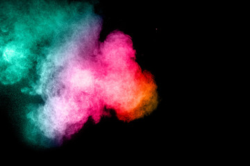 Colored powder splash cloud isolated on black background