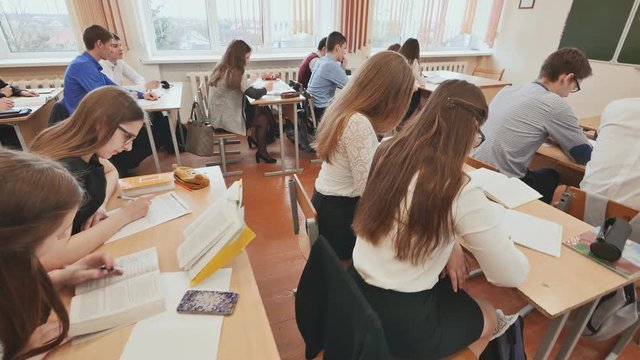 Students in the classroom are at their desks. Russian school.