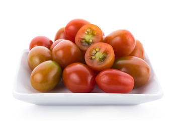 tomato in white plate on white background