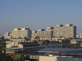 view on Lodz city center with old tower block of flats roofs and chimney