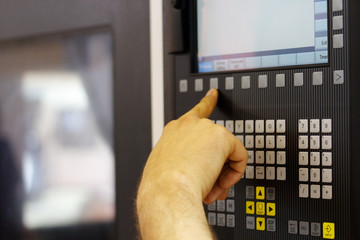 operator working with cnc machine
