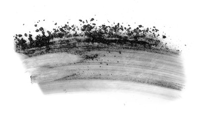 particles of charcoal on a white background