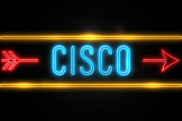 Naklejka na ściany i meble Cisco - fluorescent Neon Sign on brickwall Front view