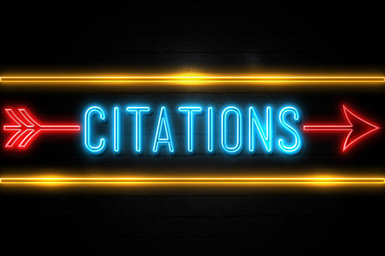 Citations  - fluorescent Neon Sign on brickwall Front view