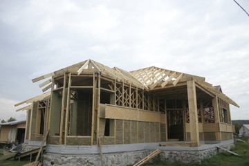 Frame house made of straw. Facade