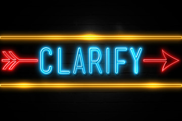 Fototapeta premium Clarify - fluorescent Neon Sign on brickwall Front view