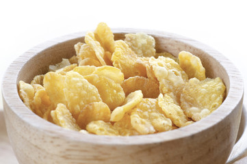 close up cereal in wooden bowl