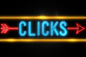 Clicks  - fluorescent Neon Sign on brickwall Front view
