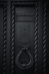 Details of beautiful dark gray door. 