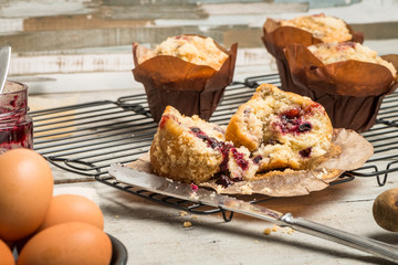 Muffins with red fruits jam fill.