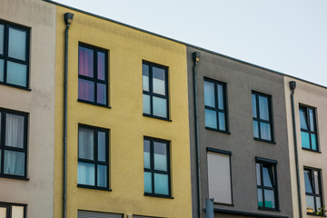 Fototapeta na wymiar darken colored row houses