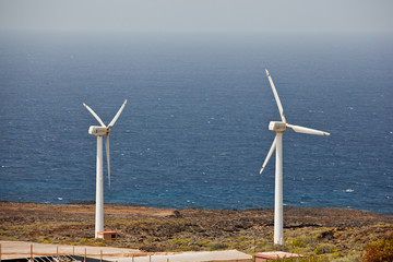 wind turbines on the ocean shore