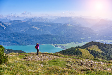 Woman with backpack in mountains