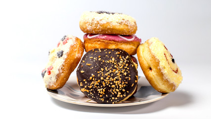 Group of glazed donuts on white background