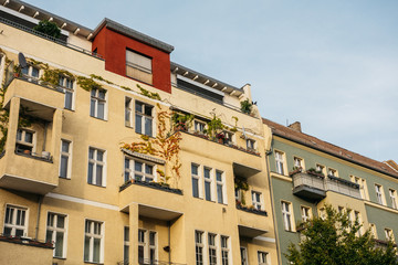 Fototapeta na wymiar yellow and grey apartment buildings