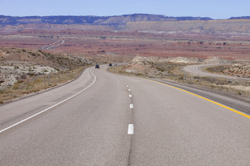 Fototapeta na wymiar Scenic Interstate 70 (I-70) in Utah in a remote section of the San Rafael Swell, part of the Colorado Plateau.