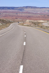 Scenic Interstate 70 (I-70) in Utah in a remote section of the San Rafael Swell, part of the Colorado Plateau.