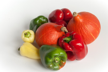 pumpkins and peppers with a white background - obrazy, fototapety, plakaty