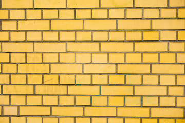 Obraz premium yellow brick wall texture in high contrasts