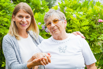 Senior lady with beautiful granddaughter