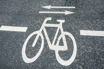 bicycle traffic sign at street on a rainy day