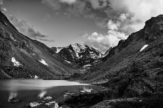 Black and white photo mountain range with valley, mountain lakes and river during sunset, national park in Altai republic, Siberia, Russia