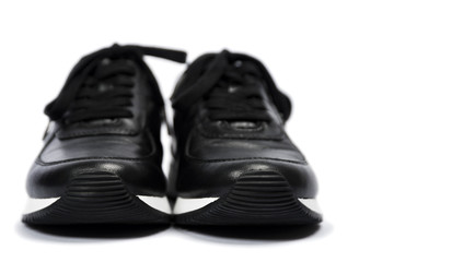Black sneakers isolated on white background