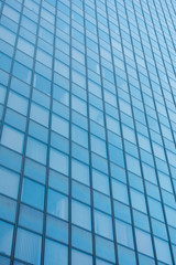 blue glass facade with lines
