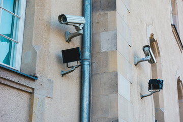 security cameras on a marble building