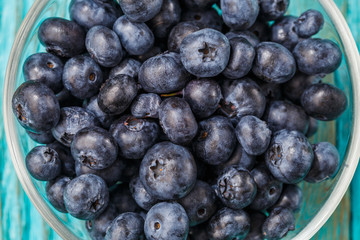 Bowl with fresh blueberries