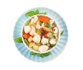 Bowl with delicious turkey soup on white background