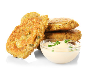 Broccoli pancakes served with sauce on white background