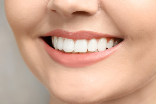 Young woman with healthy teeth, closeup