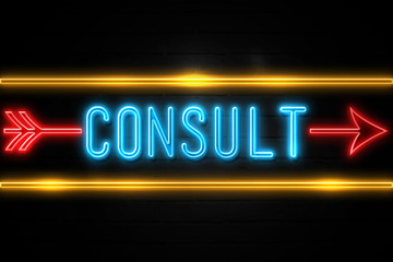 Consult  - fluorescent Neon Sign on brickwall Front view