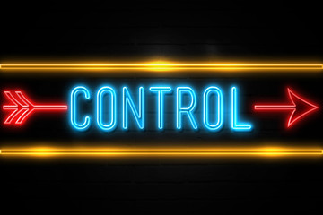 Control  - fluorescent Neon Sign on brickwall Front view