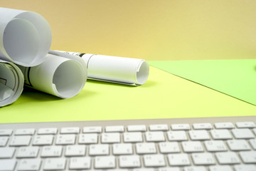 Workplace of architect - rolls and plans.