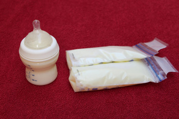 breast milk in baby bottle and storage bags