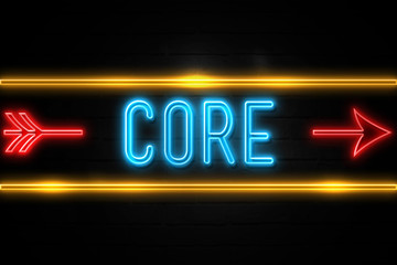 Core  - fluorescent Neon Sign on brickwall Front view