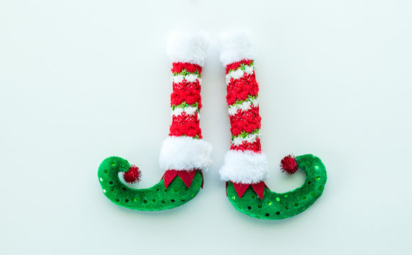 red and Green Christmas elf boots isolated on white