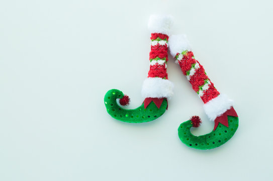 red and Green Christmas elf boots isolated on white