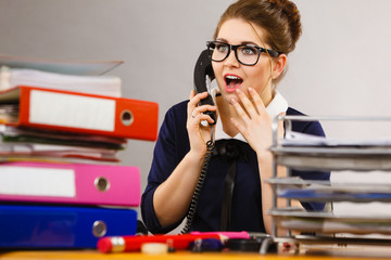 Happy secretary business woman in office